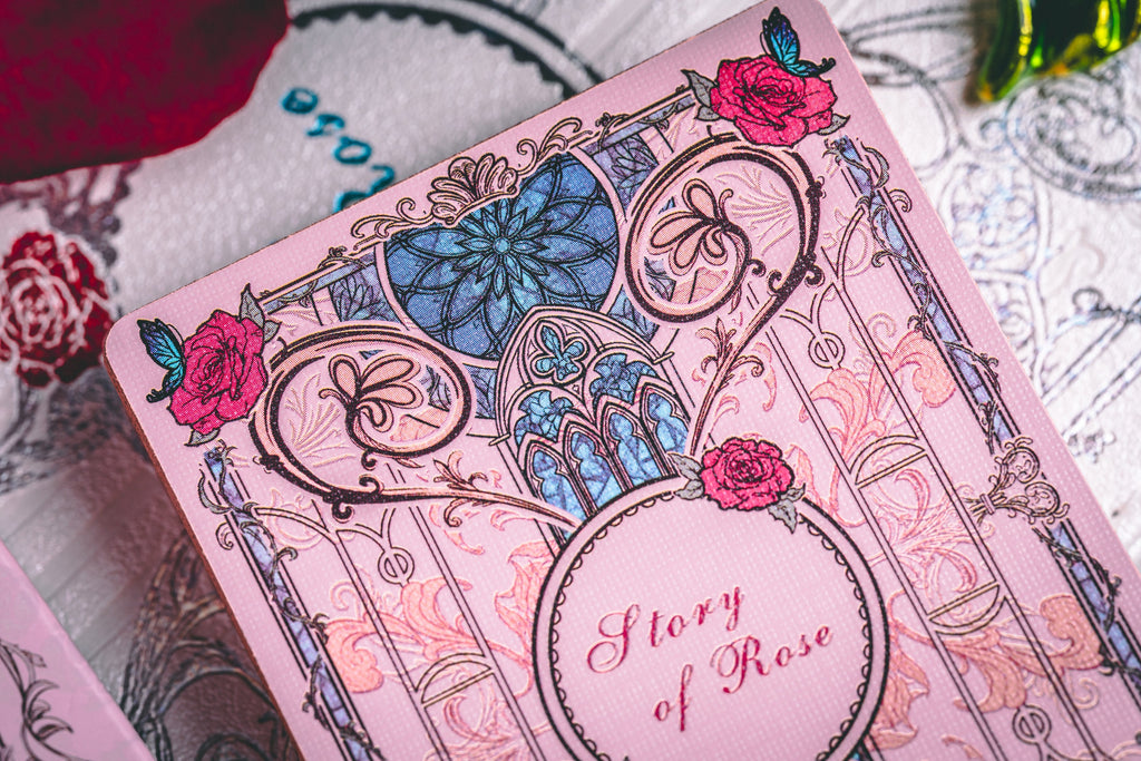 Story of Rose pink deck floral card-back detail
