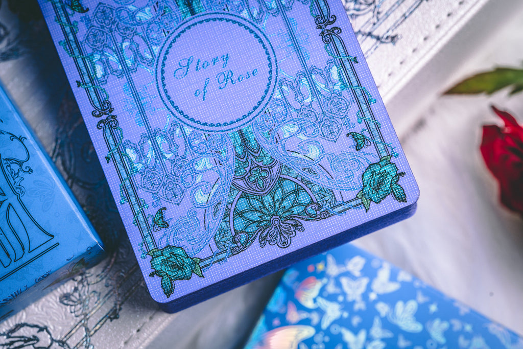 Story of Rose blue deck floral tuck-box detail