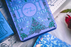Story of Rose blue deck floral tuck-box detail
