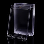 Stack of clear hard plastic card holders on a dark surface